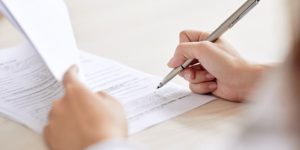 person signing an ndis service agreement person signing an ndis service agreement